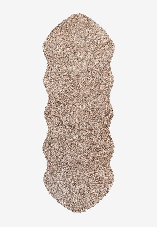 Stilriktig skinnwille matta i brun färg gjord i fårskinn.