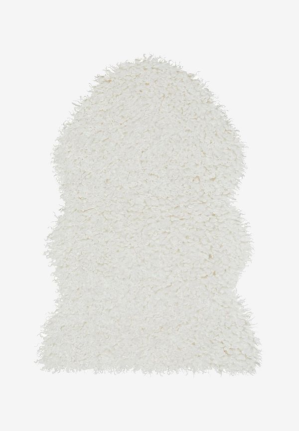 Jättefin vit matta i fårskinn från Skinnwille.