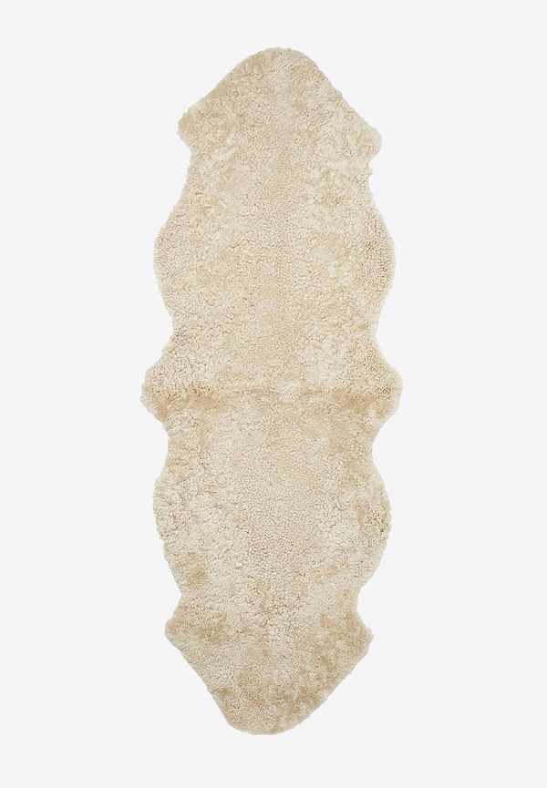 Modern fårskinnsmatta i brunt från Skinnwille.