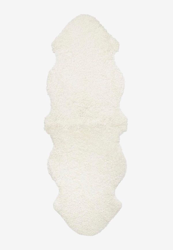 Snygg skinnmatta i vitt från Skinnwille.