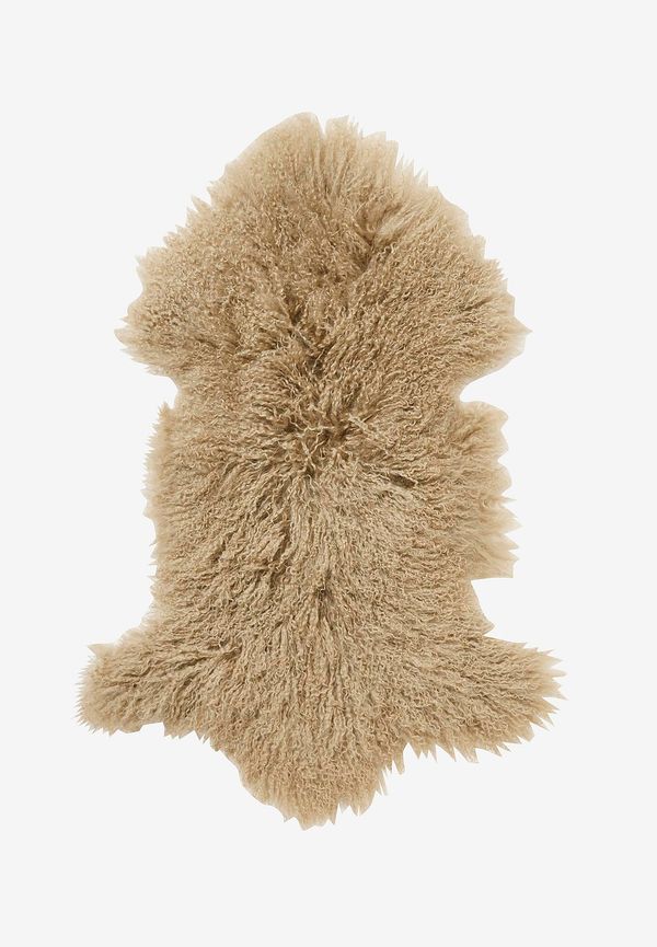 Exklusiv skinnmatta i brunt från Skinnwille.