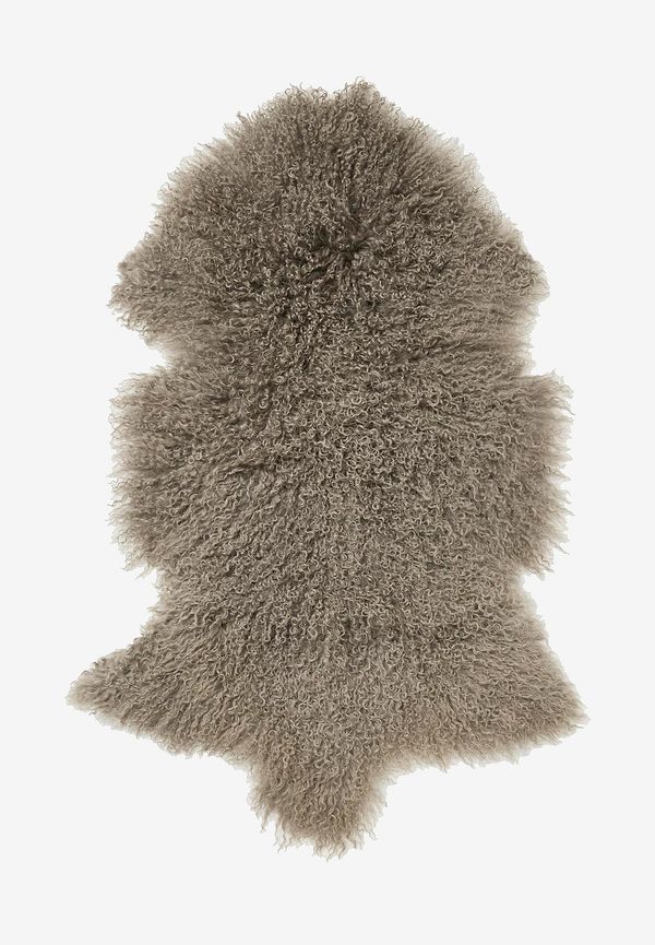Brun Skinnwille-fårskinnsmatta i moderiktig modell.