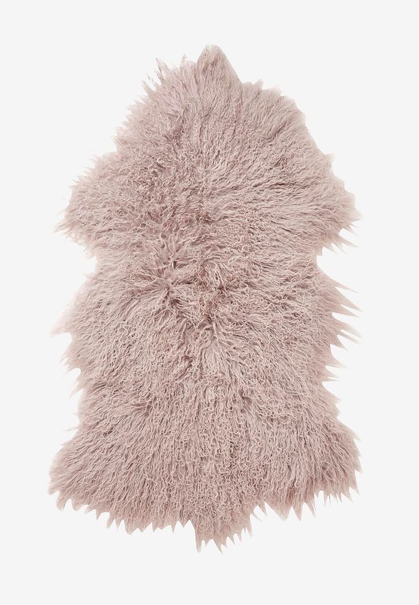 Stilren skinnmatta i rosa från Skinnwille.
