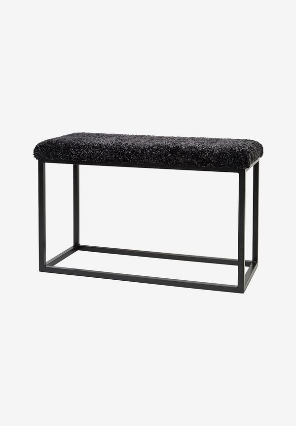 Grå Skinnwille-bänk i snygg modell.
