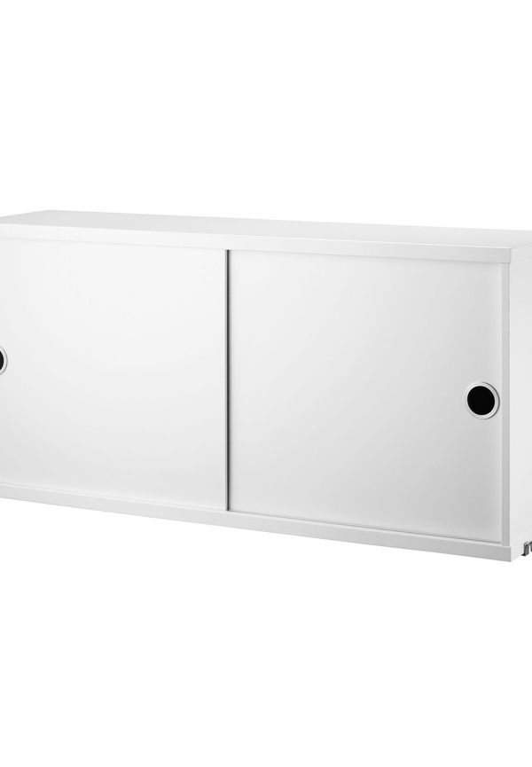 Komfortabel skjutdörr 2024 från String Furniture.