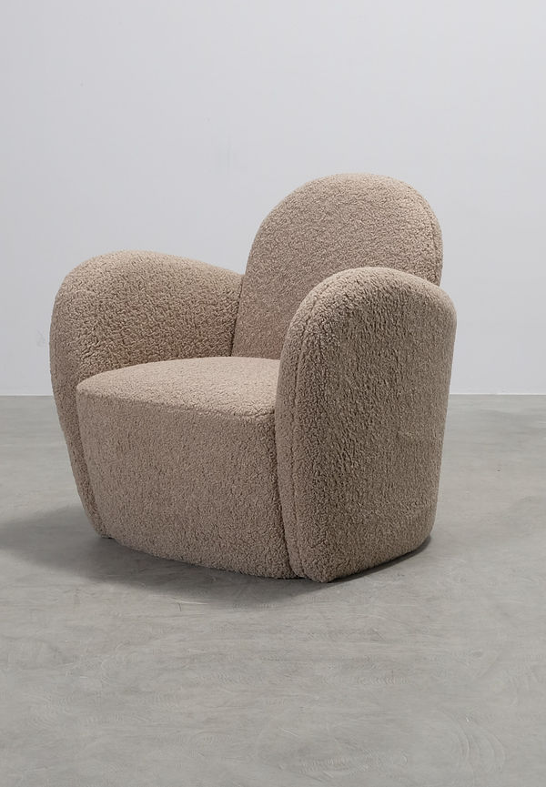 Beige Sofacompany-fåtölj i fantastiskt snygg modell.
