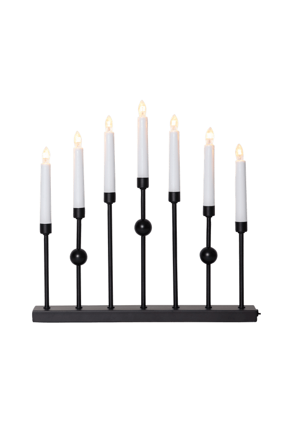 Svart Star Trading-lampa i stilren modell.