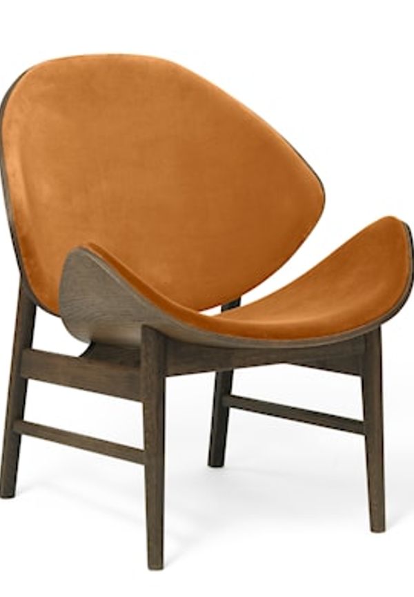 Smickrande fåtölj 2025 från Warm Nordic.