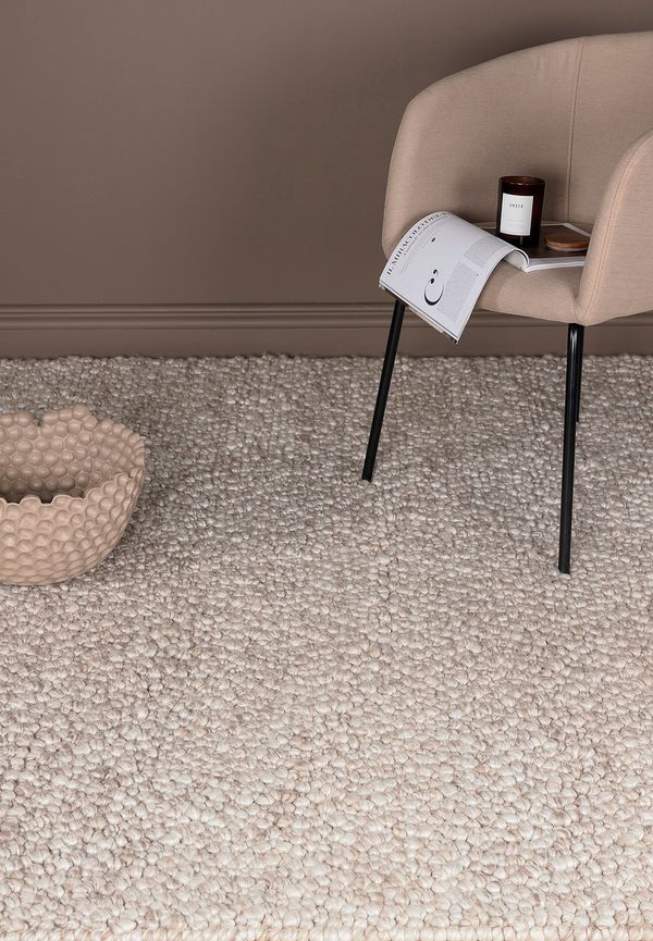 Supersnygg ullmatta i beiget från Venture Home.