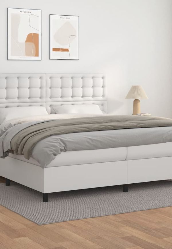 Moderiktig vidaxl säng i vit färg gjord i bomull.