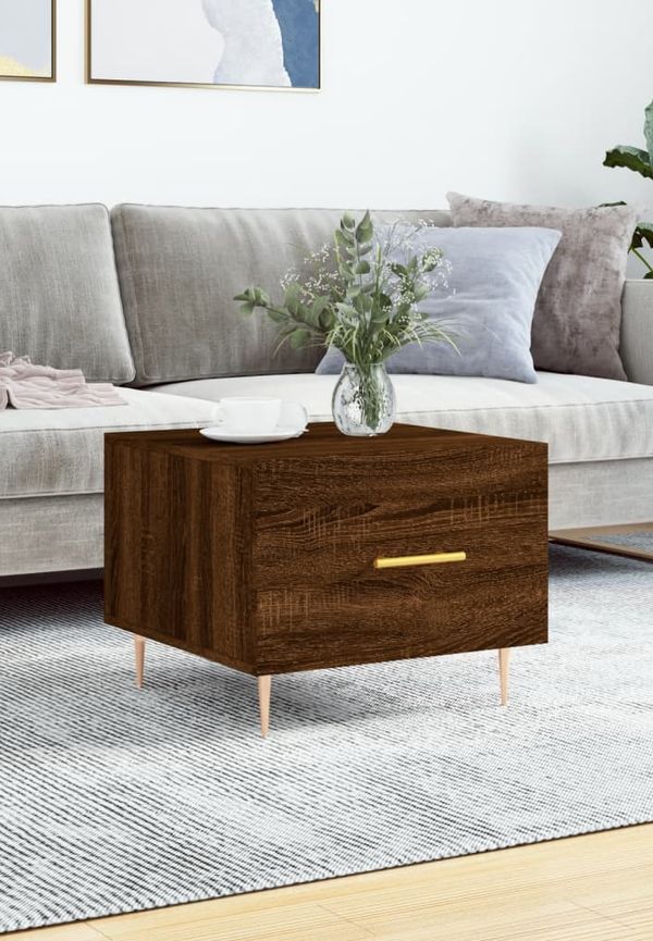 Söt soffbord i brun färg gjord i järn.