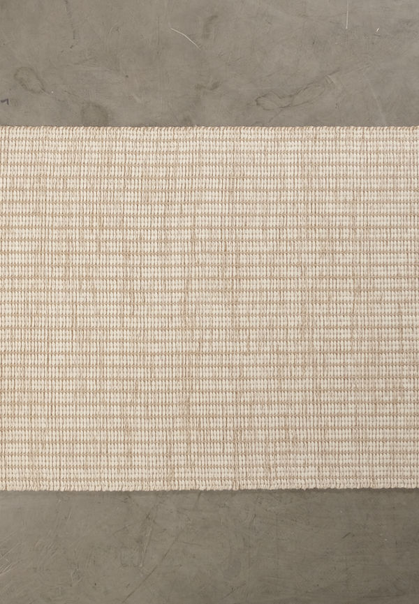 Otroligt fin ullmatta i beiget från Woven Works.