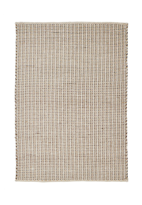 Modern beige matta i ull från Woven Works.