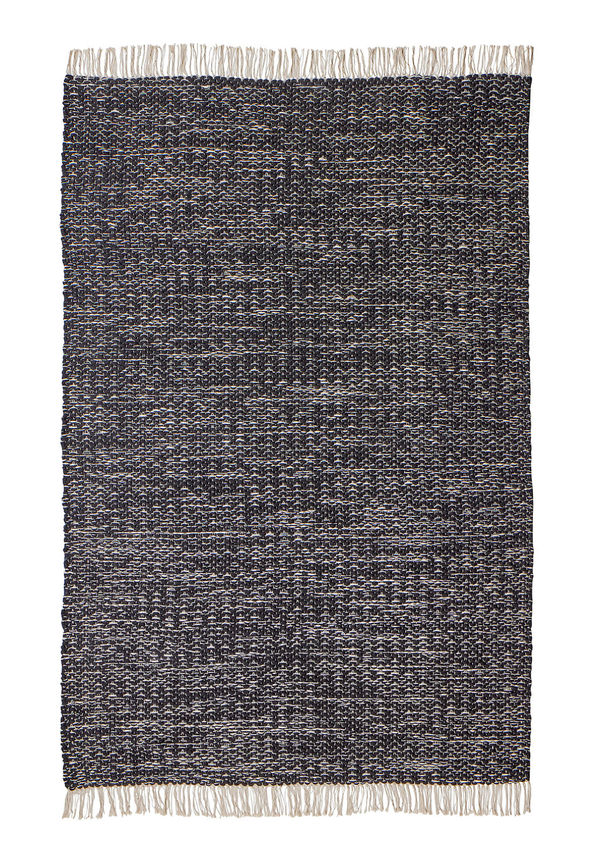 Fin svart matta i ull från Woven Works.