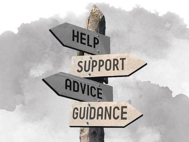 A pole with the words help, support, advice and guidance