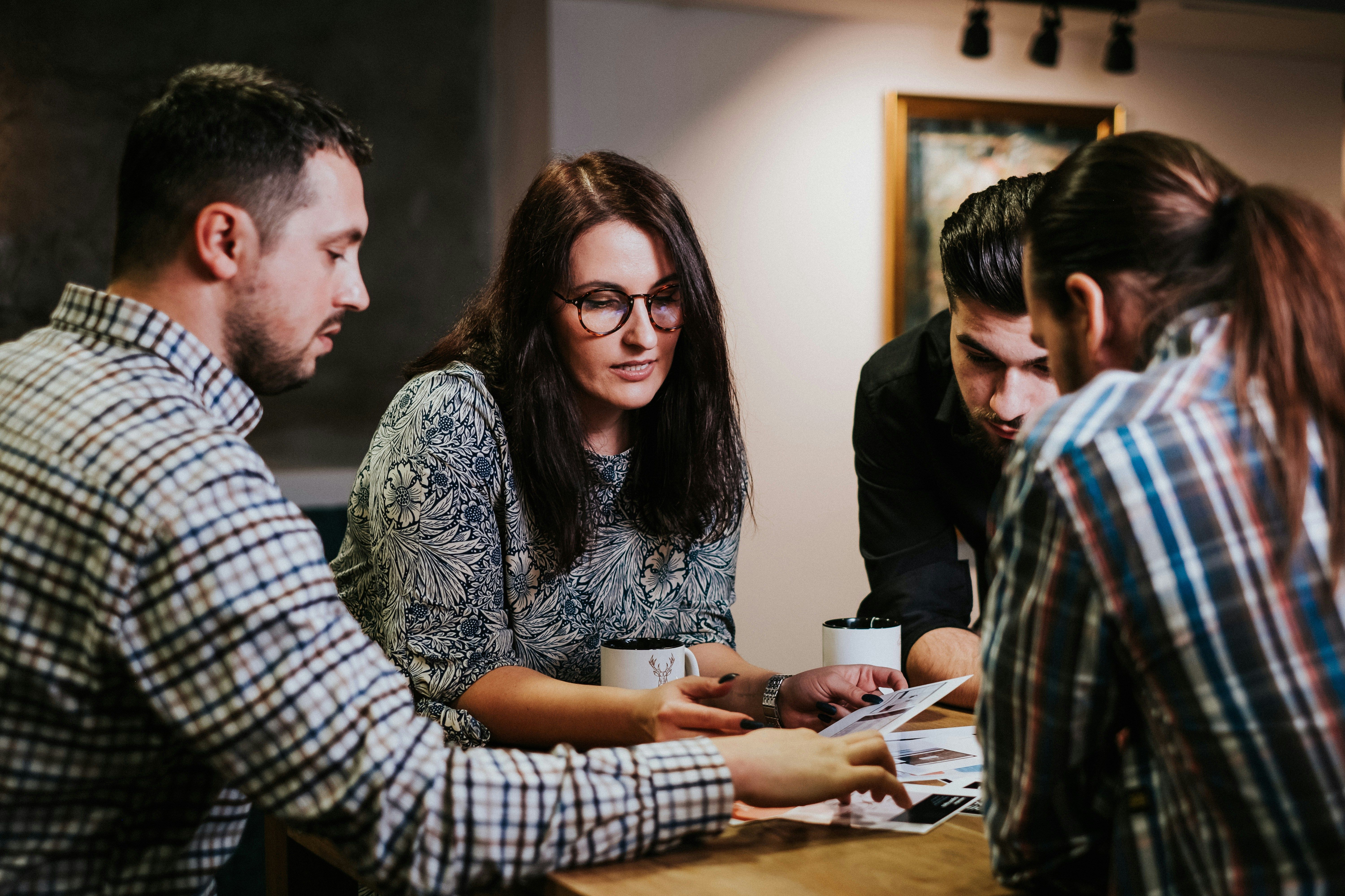 Person calculating daily expenses and redirecting them toward investments
