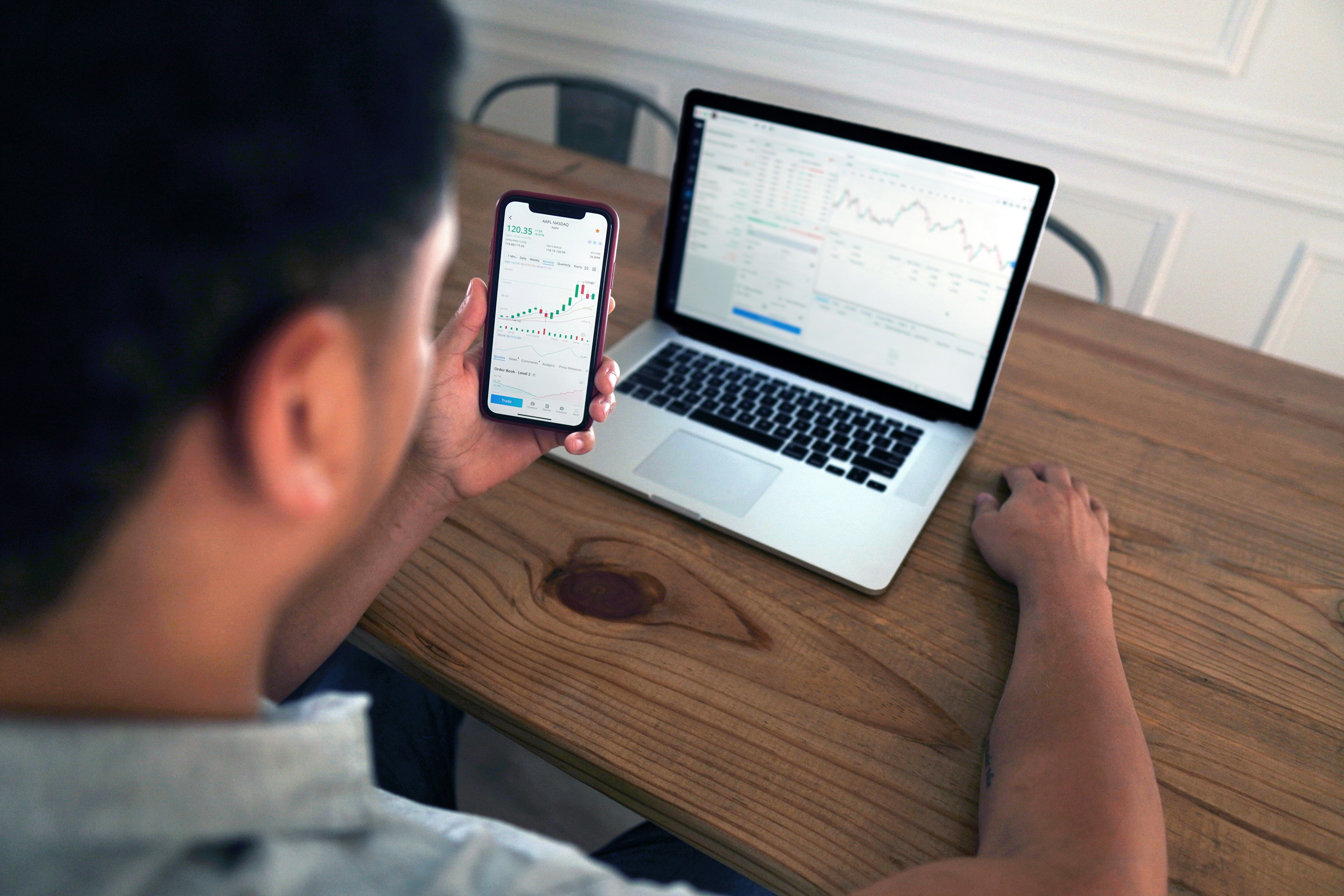 A focused investor reviewing long-term financial planning documents