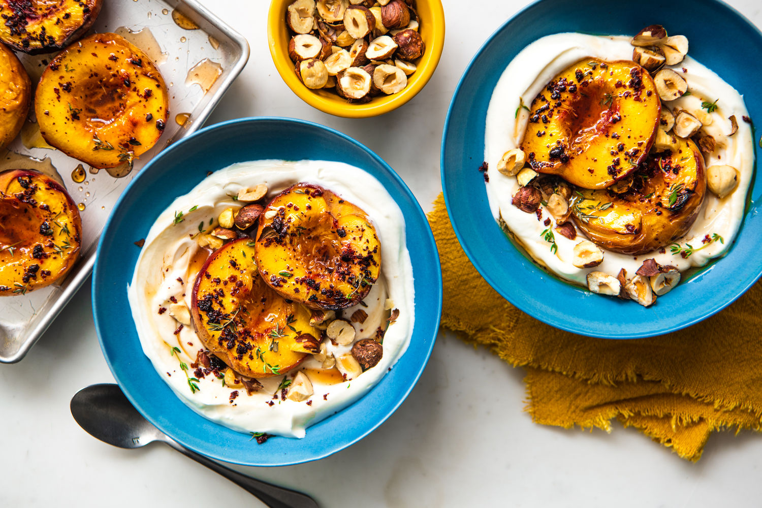 Thyme and Sumac Baked Peaches with Elderflower Yoghurt and Hazelnuts — The  Doctors Kitchen