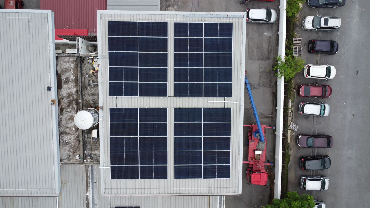 Commercial rooftop solar installation at Momento Puchong by Inhome Solar