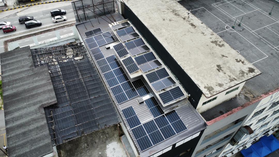 Commercial rooftop solar panel installation at Redwood Pharmacy, Kuchai, by Inhome Solar