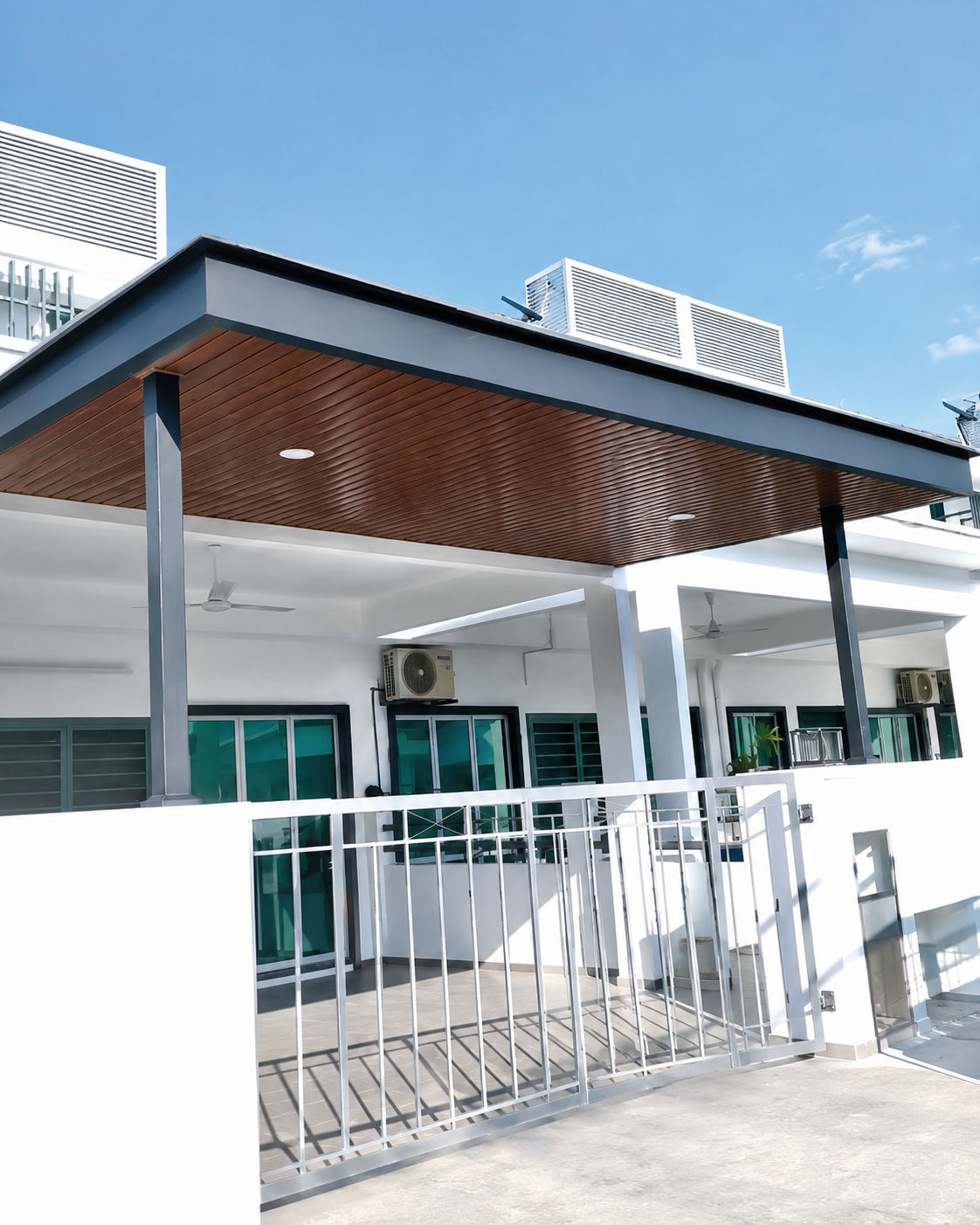 Close-up of thickened pergola fascia and aluminium strip ceiling detail