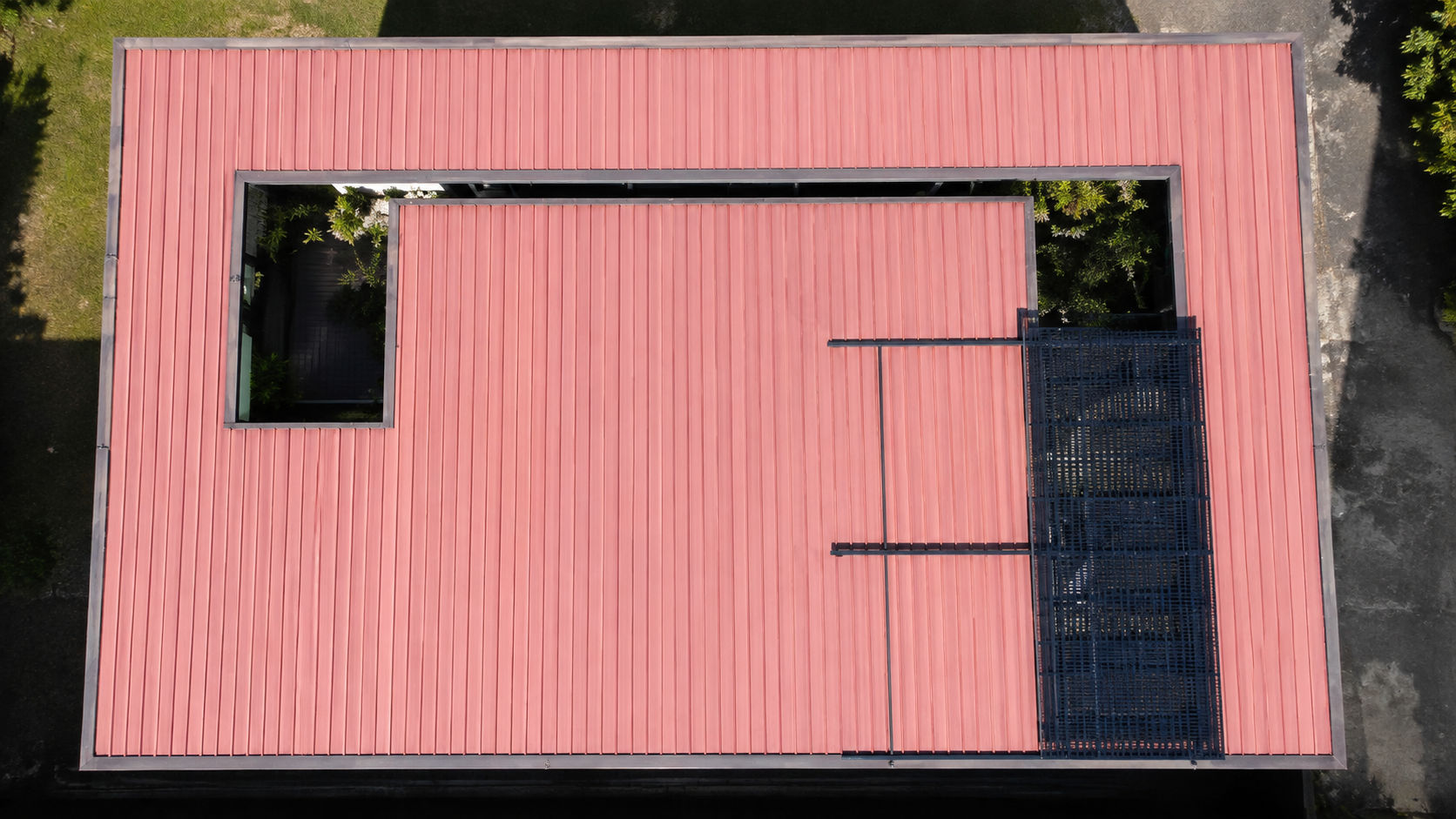 Aerial view of Tettro retractable roof with partial opening