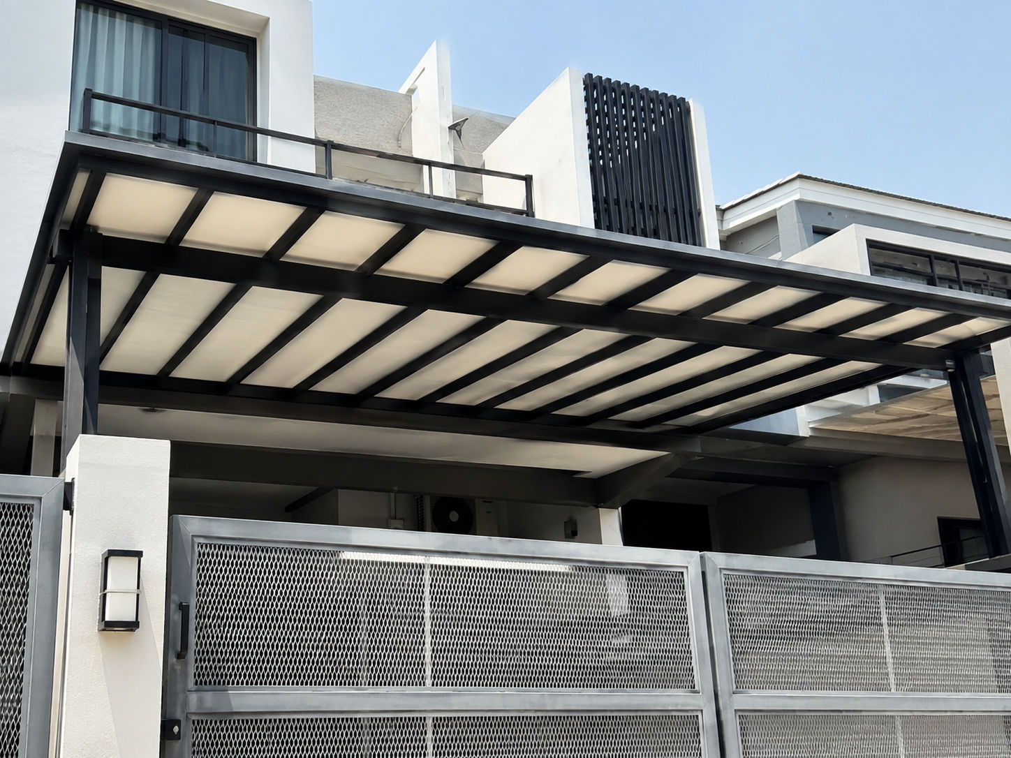 ACP awning installed on a contemporary home exterior