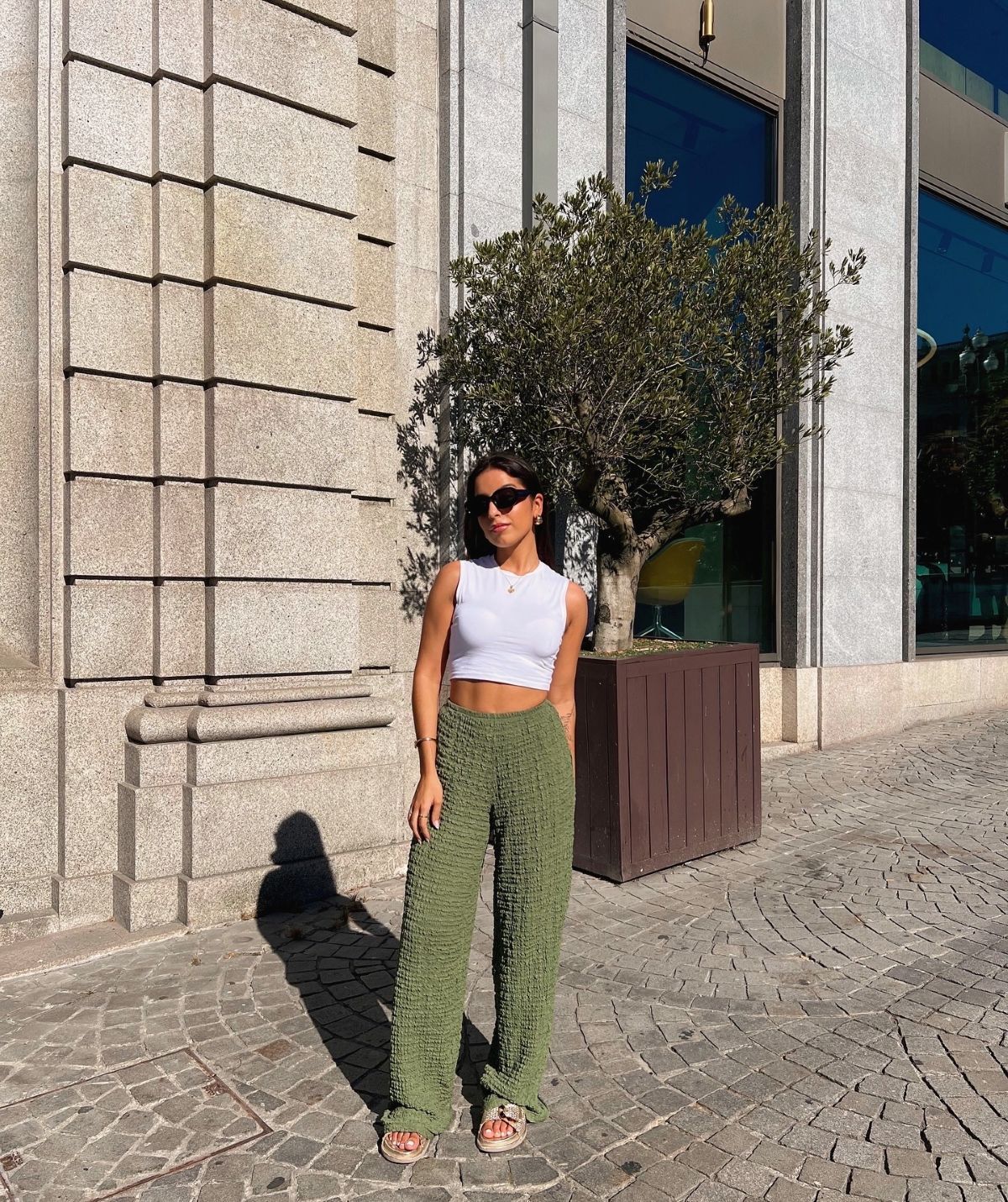 A travel look photographed on a street in Portugal