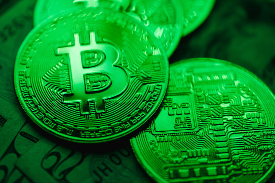 crypto coins with dollar bills