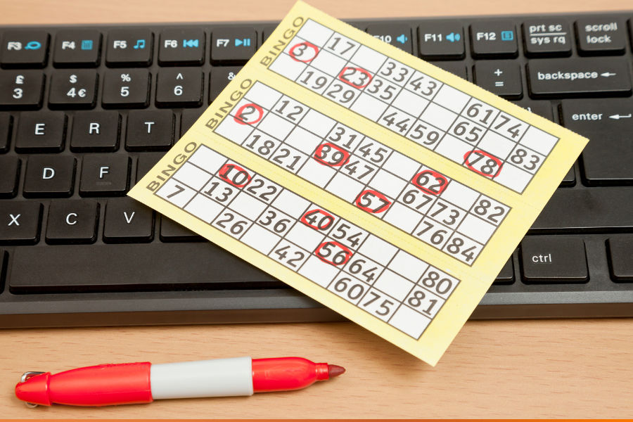 bingo papers on a keyboard