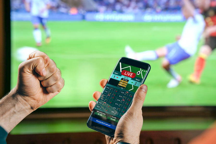 a man betting for a football match