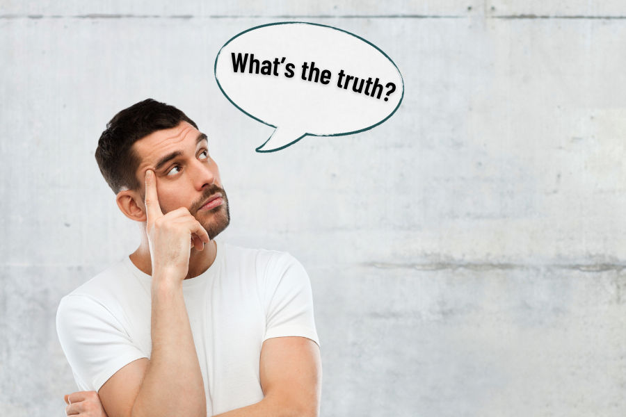 A person thinking about myths and facts