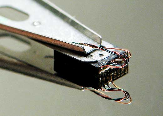 A hard drive head without its body