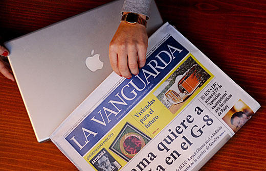 A laptop bag that is camouflaged as a newspaper. Fucking genius!