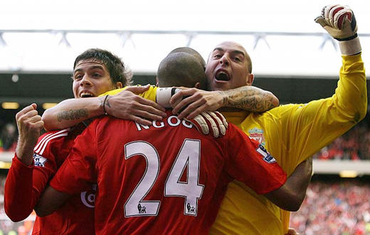 Daniel Agger and Pepe Reina smother the scorer of the second goal, David Ngog