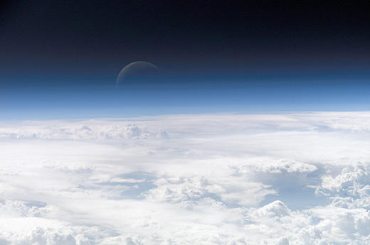 A photograph of the top layers of the earth’s atmosphere leading to space