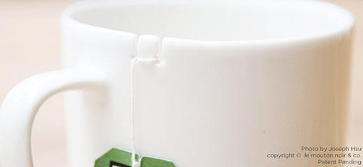 George Lee's Tie Tea: A simple cleat on the lip of a mug to tie your tea bag to