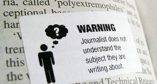 Pasting warning labels over crappy newspapers
