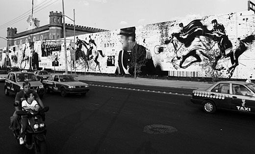 A mural installation in Mexico City named Black Palace on the exterior of the Archivo General de la Nación (the General National Archives)