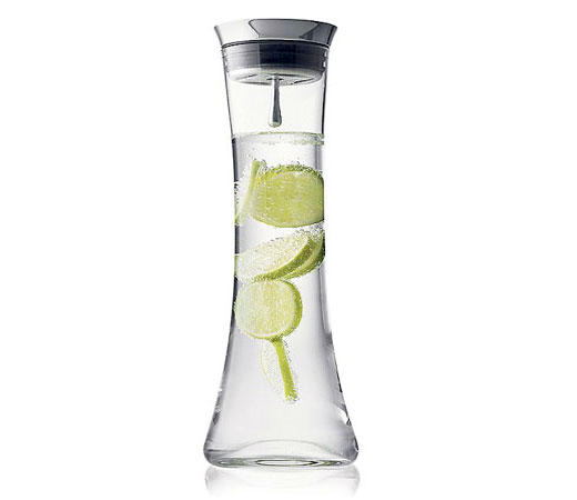A beautiful looking water jug which holds back ice cubes when you pour out water