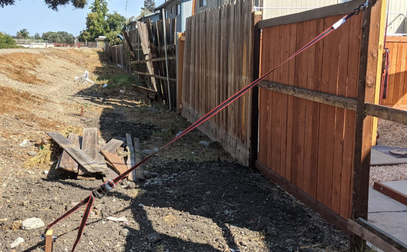 Straighten a Fence Post Using a Ratchet Strap