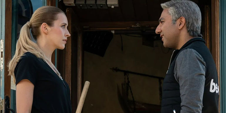 Nick Mohammed as Nathan Shelley facing a serious-looking Edyta Budnik as Jade in Ted Lasso