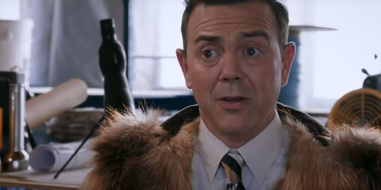Joe Lo Truglio as Charles Boyle in Brooklyn Nine Nine 99 wearing a fur coat