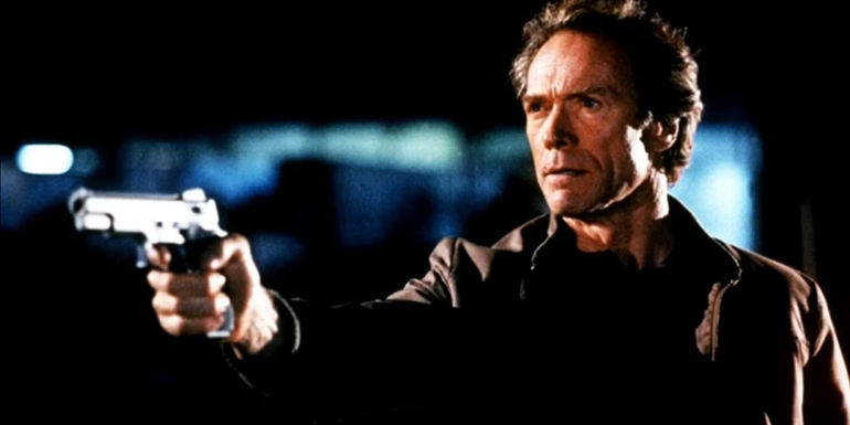Clint Eastwood with a gun in The Rookie