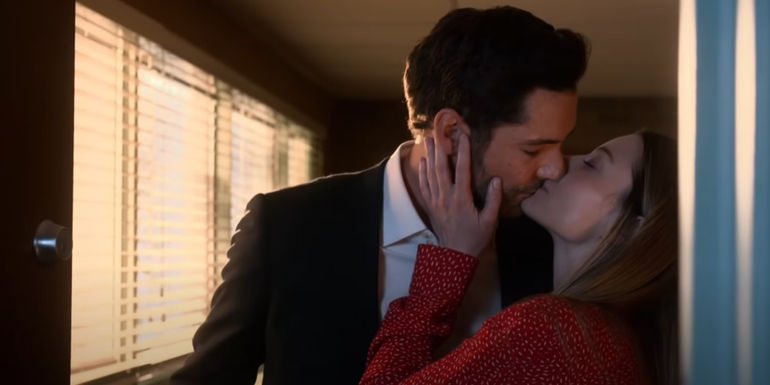 Tom Ellis and Lauren German as Lucifer Morningstar and Chloe Decker kissing in Lucifer Season 6