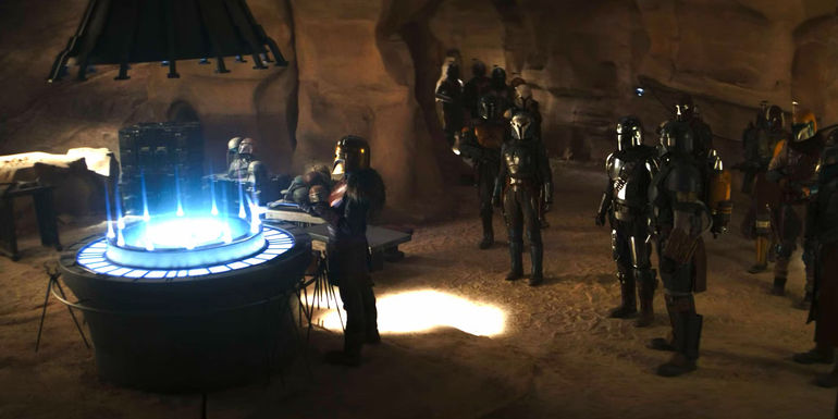 Din Djarin, Bo-Katan Kryze, the Armorer, Paz Vizsla, and more Mandalorians gather in the forge in The Mandalorian season 3 episode 3