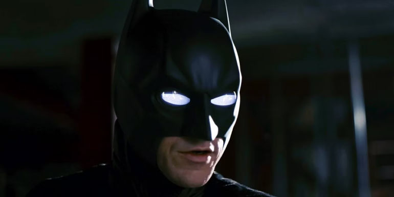 Batman's eyes are completely white as he activates his suit's sonar technology