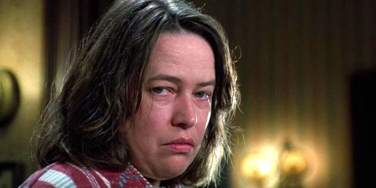 Kathy Bates as Anne Wilkes, with a cruel look, in the film Misery.