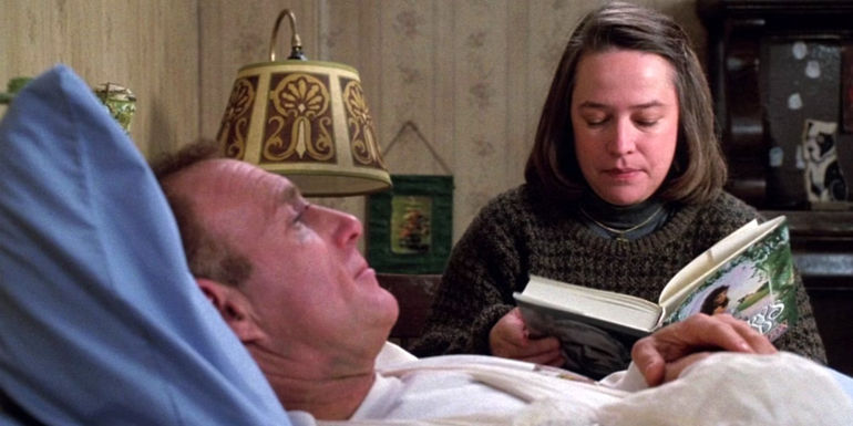 Anne reading a book to Paul in the film Misery.