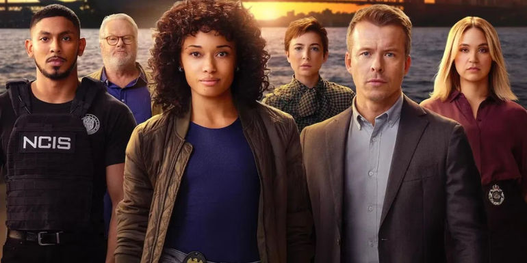 The cast of NCIS: Sydney looks at the camera with harbor behind them in a promotional image for the show